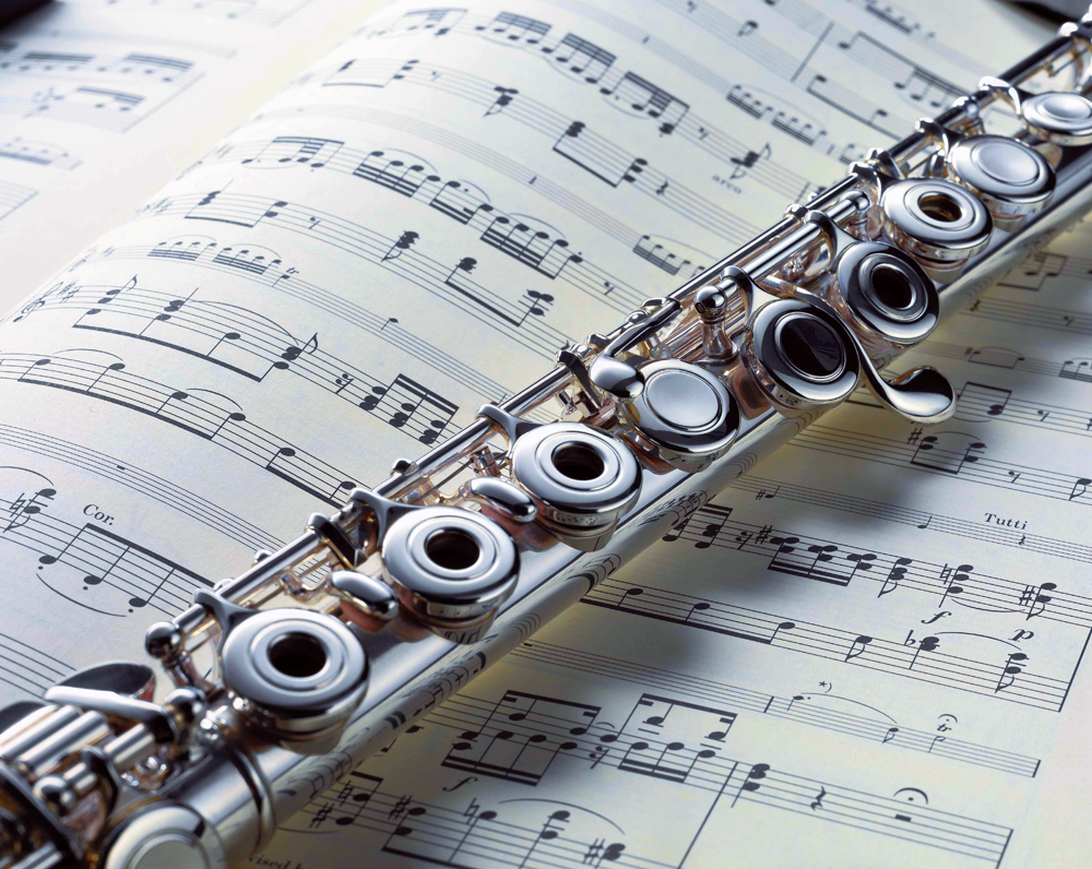 Flute and Music Sheet - Music Makers Calgary